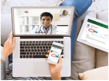 image of a person using telethealth on their computer