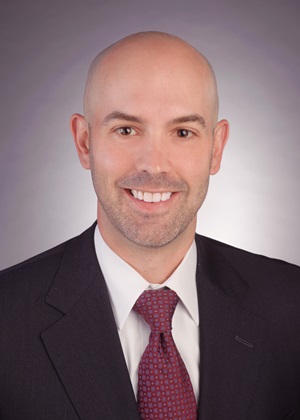 Dr. Vincent DiNapoli headshot Head shot of Dr. Vincent DiNapoli wearing a black suit and red tie.
